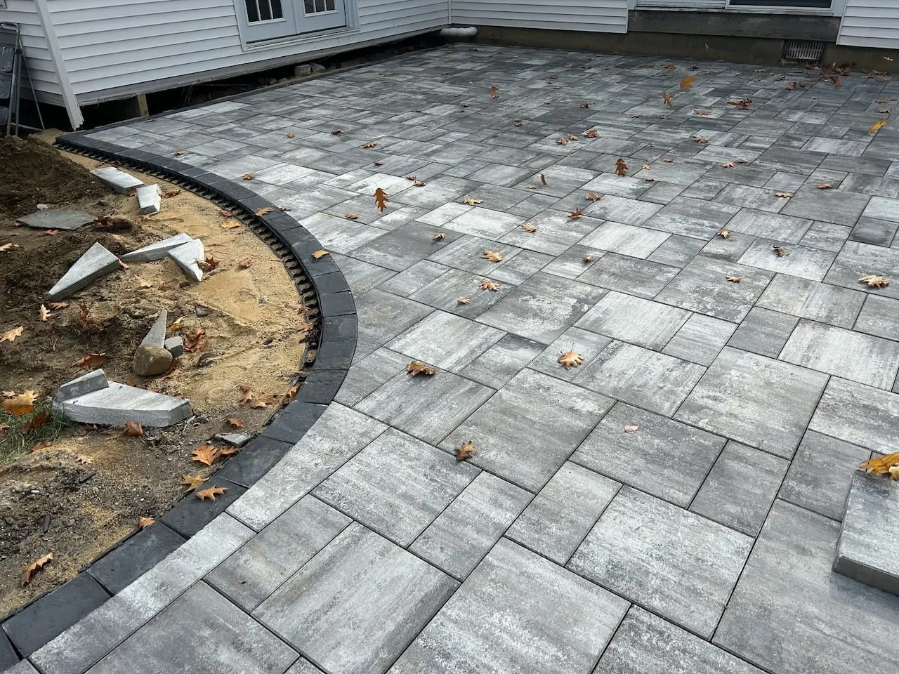 Curved Charcoal-Border Paver Patio — Patios in Southern NH, NH