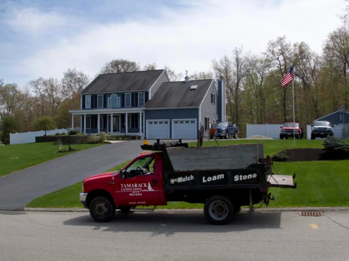 A Tamarack Landscaping truck on a job site in southern New Hampshire
