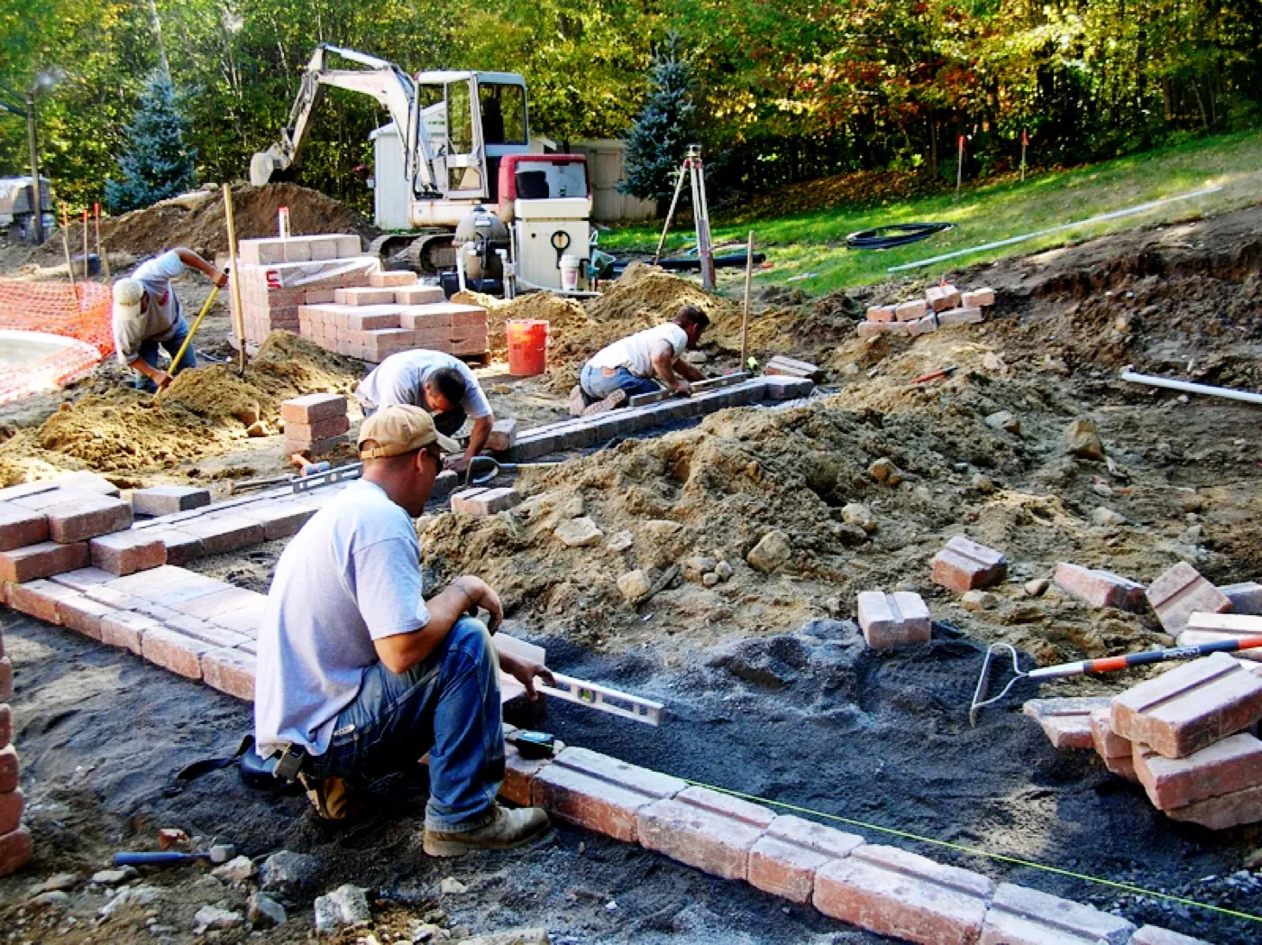 The Tamarack crew installing a paver patio